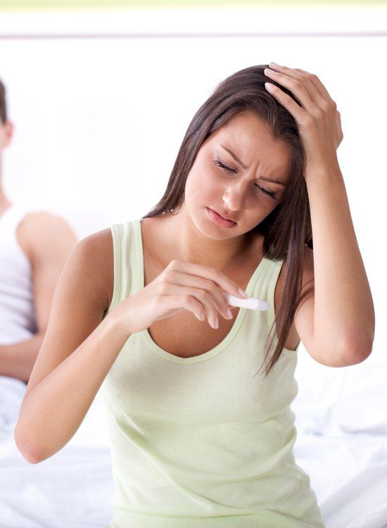 missed period but negative pregnancy test concept worried woman