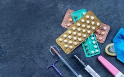 birth control pills and fertility concept woman planning pregnancy
